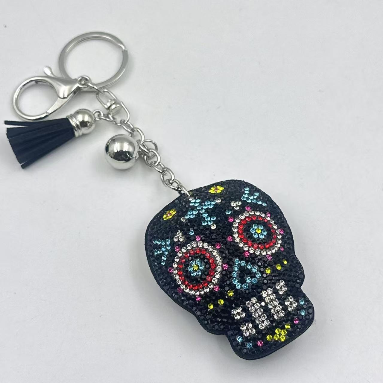 Diamond-studded and rhinestone-studded keychain