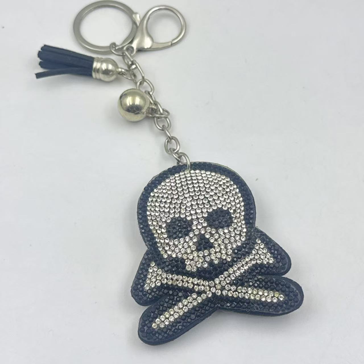 Diamond-studded and rhinestone-studded keychain